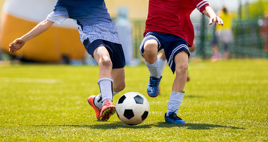A picture of a people playing football.